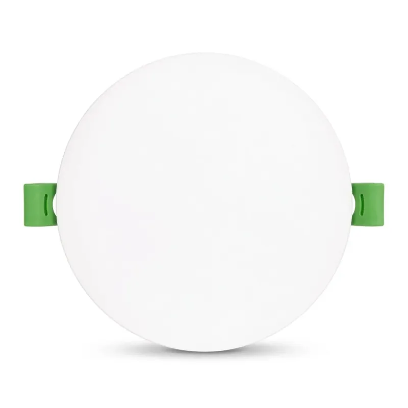White circular frameless LED downlight, front diffuser view with green mounting clips