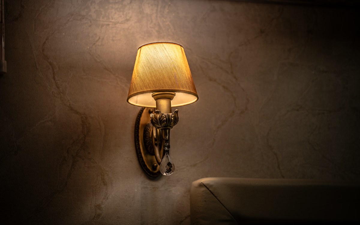 Decorative wall light with a warm white LED bulb